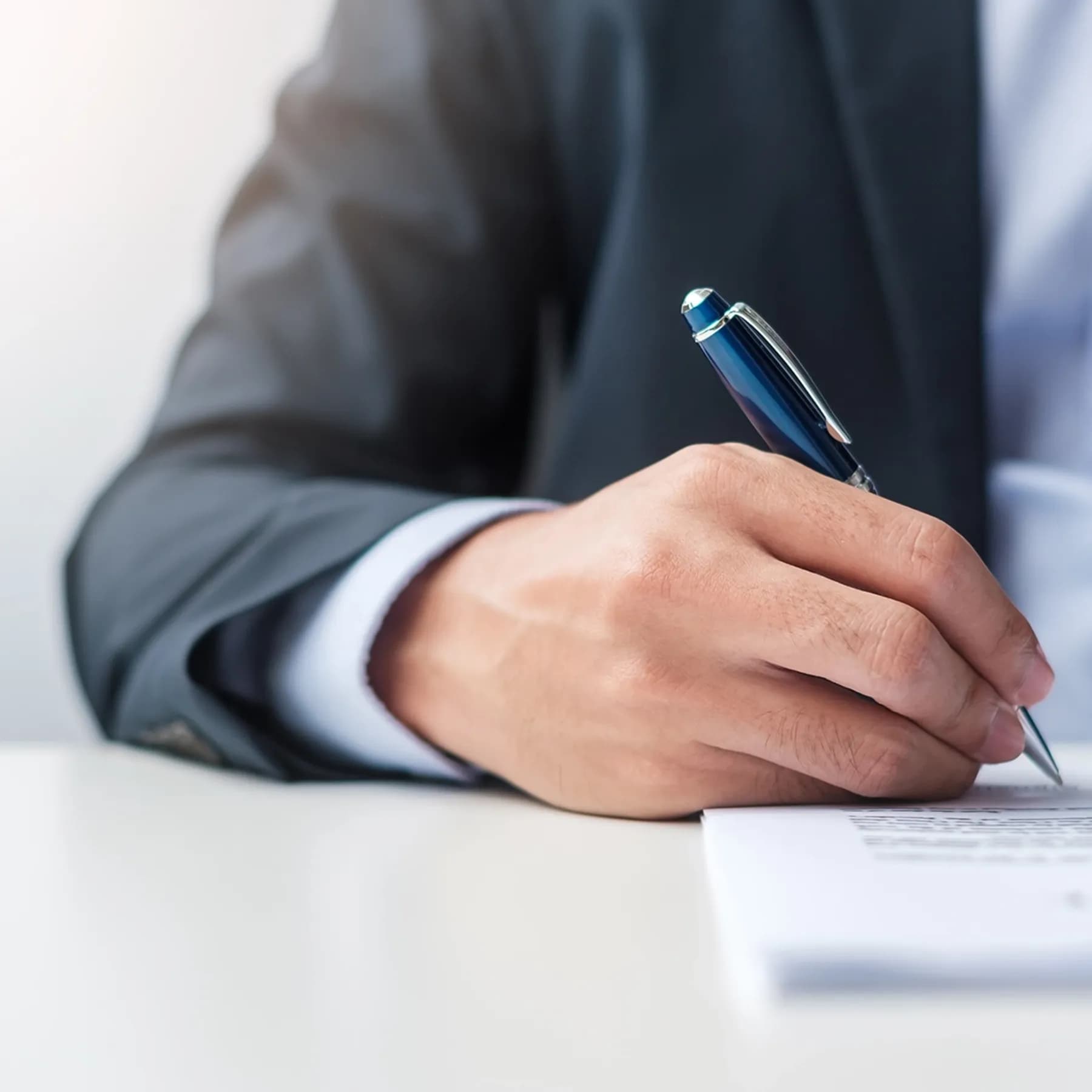 Man signing document