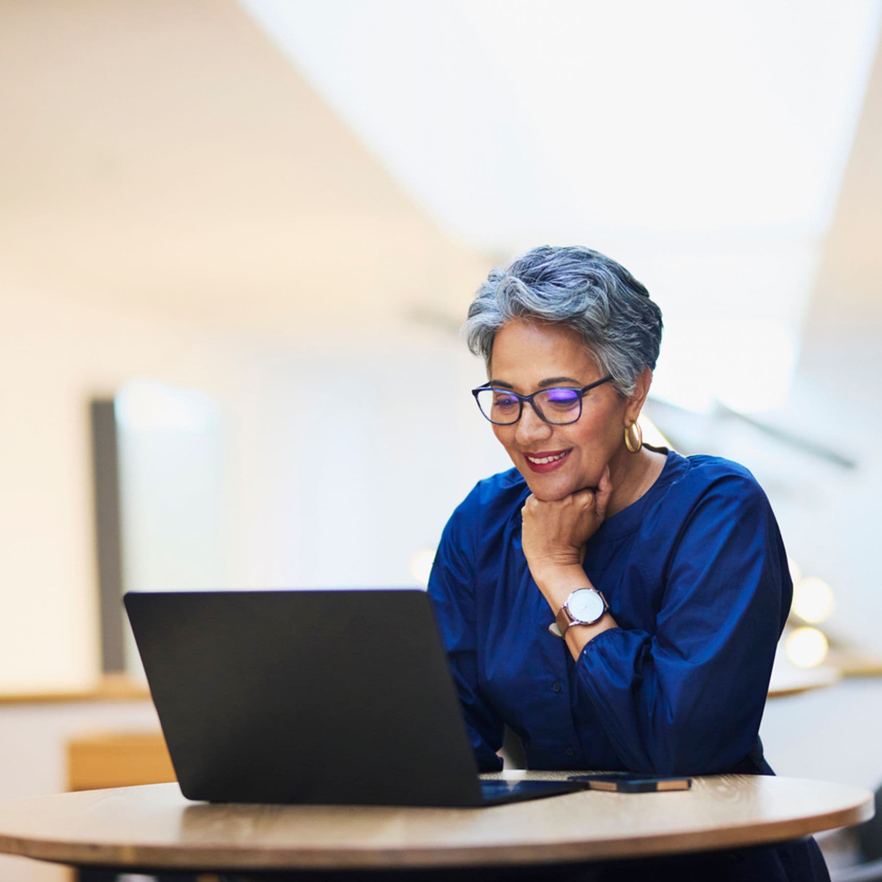 A woman working on laptop