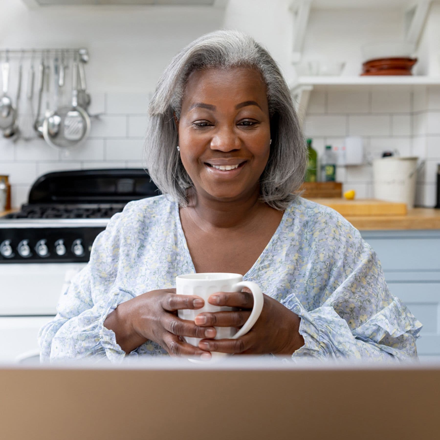 Woman looking at her laptop